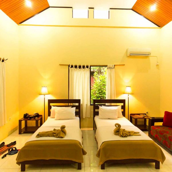 Murex Resort Manado twin bed set up